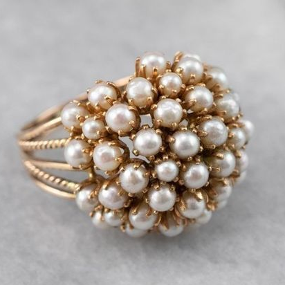 Ring with Embedded Pearls